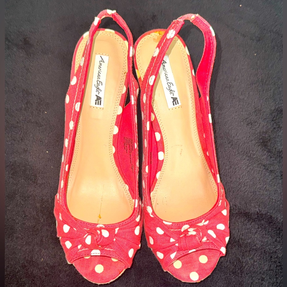 Salmon colored polkadot wedge sandals by American Eagle